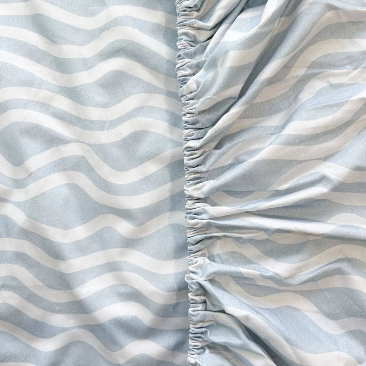 Little Human Linens Waterproof Cot Sheet - Bright Waves